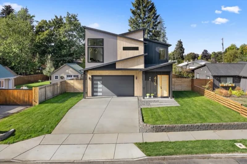Aerial view of modern home with fresh landscaping