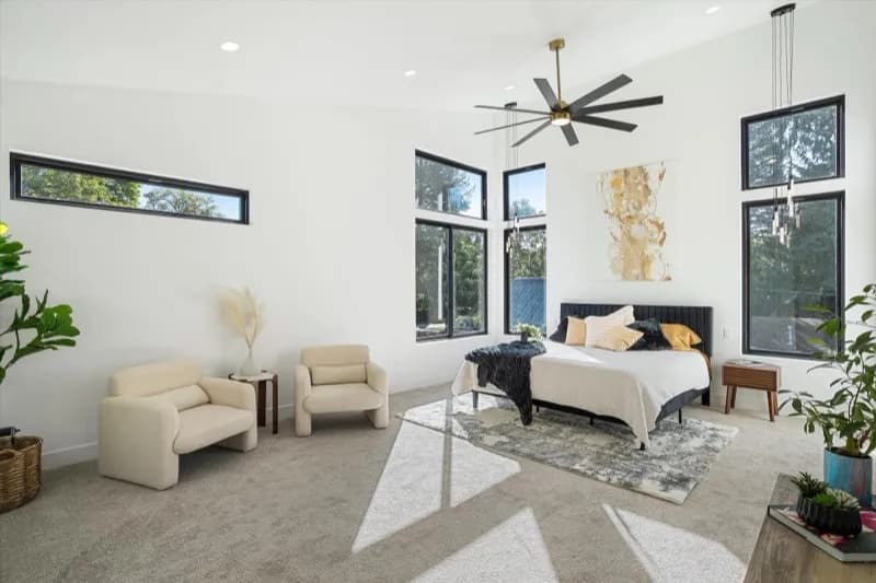Master suite with floor-to-ceiling windows