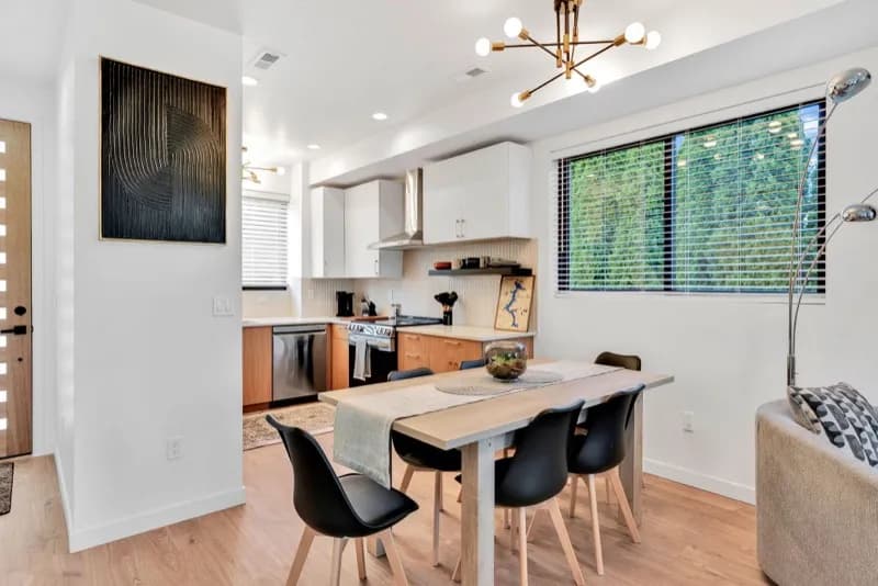 Kitchen and dining area with sputnik chandelier