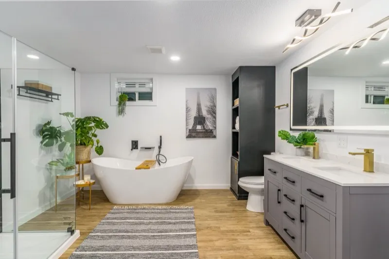Spa bathroom with freestanding tub and plants