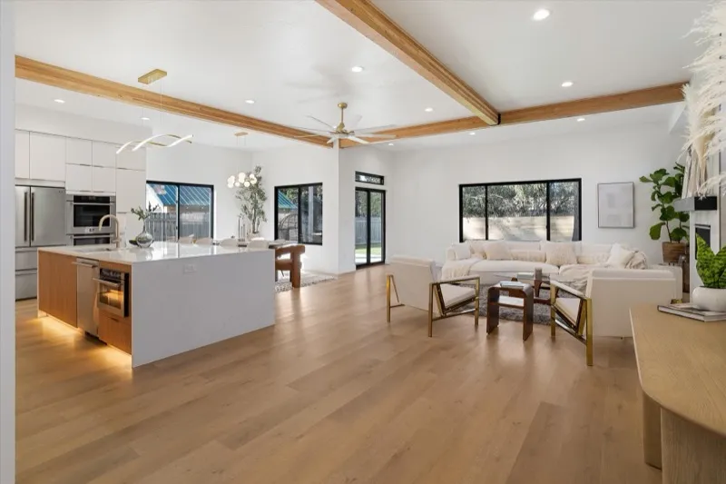 Open floor plan with kitchen island and living area